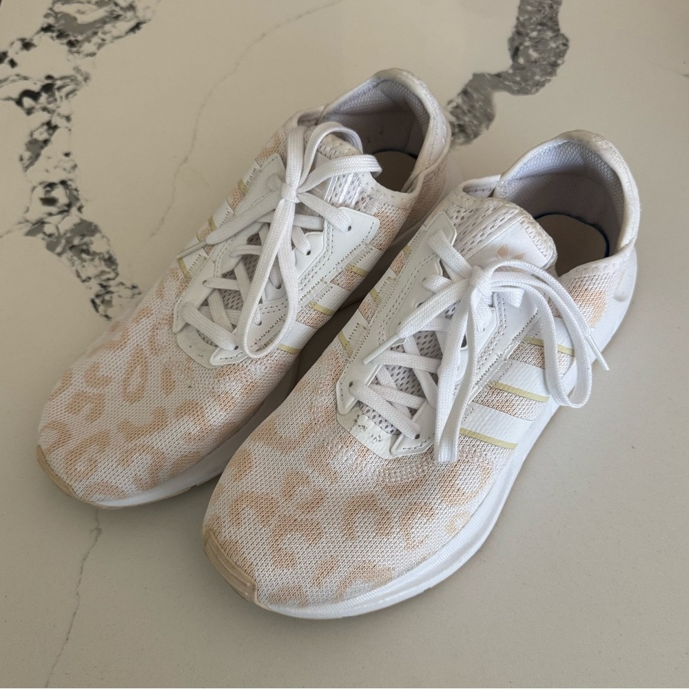 adidas Originals Swift Run sneakers in white leopard print